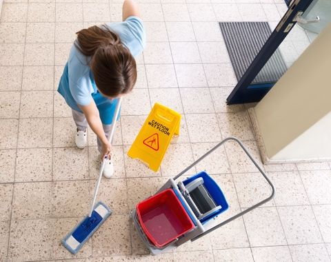 Wet-floor-sign-yellow-on-wet-floor