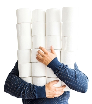 Man-carrying-lots-of-toilet-paper-rolls Man-carrying-lots-of-toilet-paper-rolls